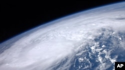 August 25: NASA image of Hurricane Irene moving over the Caribbean taken by astronaut Ron Garan from the International Space Station. REUTERS/NASA/Ron Garan