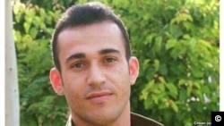 Iranian Kurdish dissident Ramin Hossein Panahi, who faces execution in Iran for membership in the Kurdish nationalist group Komala, appears in this undated photo.