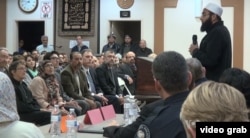 Muslims, and their Christian and Jewish neighbors gathered at a mosque to pray for the San Bernardino mass shooting victims and their families, Corona, Calif., Dec. 11, 2015.