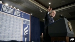 President George W. Bush takes a question from the audience at Freedom House, Wednesday, March 29, 2006 in Washington, DC.