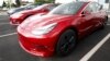 Tesla Shares Jump on Model 3 Numbers, Musk Deal