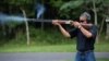 Obama practica tiro al blanco 