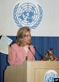 FILE - In this Tuesday, Sept. 5, 1995 file photo, first lady Hillary Clinton addresses a panel on women's health and security at the U.N. Women's Conference in Beijing.