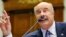 FILE - Dr. Phil McGraw, television personality and psychologist, speaks at a hearing US House committee hearing in Washington, June 24, 2010.