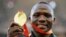 FILE - Javelin gold medalist Kenya's Julius Yego celebrates on the podium at the World Athletics Championships at the Bird's Nest stadium in Beijing, Aug. 27, 2015