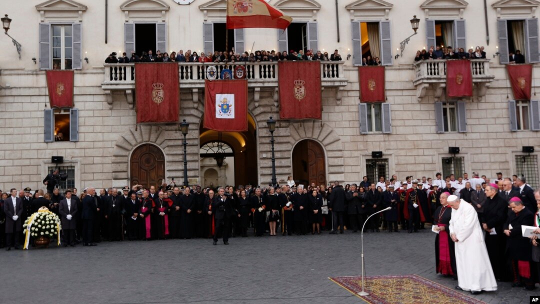 Pope Francis prays in front of the statue of the Virgin Mary, near Rome's Spanish Steps, Dec. 8, 2017, an annual tradition marking the start of the city's holiday season. 