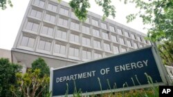 FILE - The building of the Department of Energy is seen in Washington, D.C., May 1, 2015. The Trump transition team has disavowed a survey it sent to the Department requesting the names of people working on climate change in the agency.