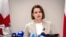 FILE - Belarusian opposition leader Sviatlana Tsikhanouskaya speaks during her news conference in Vilnius, Lithuania, Wednesday, July 7, 2021. (AP Photo/Mindaugas Kulbis)