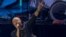 FILE - British singer Phil Collins performs on stage at the Auditorio Citibanamex on the start his "Not Dead Yet" tour in Monterrey, Mexico, March 6, 2018. 