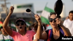 Bolivianos participaron en una protesta contra el presidente de Bolivia, Evo Morales, y los resultados electorales, en Santa Cruz de la Sierra, Bolivia, el 27 de octubre de 2019.