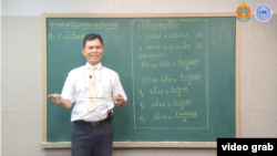 A teacher explains grade 12 math to high school students through a video stream on the Cambodian Education Ministry Facebook's page. (Courtesy of Facebook)