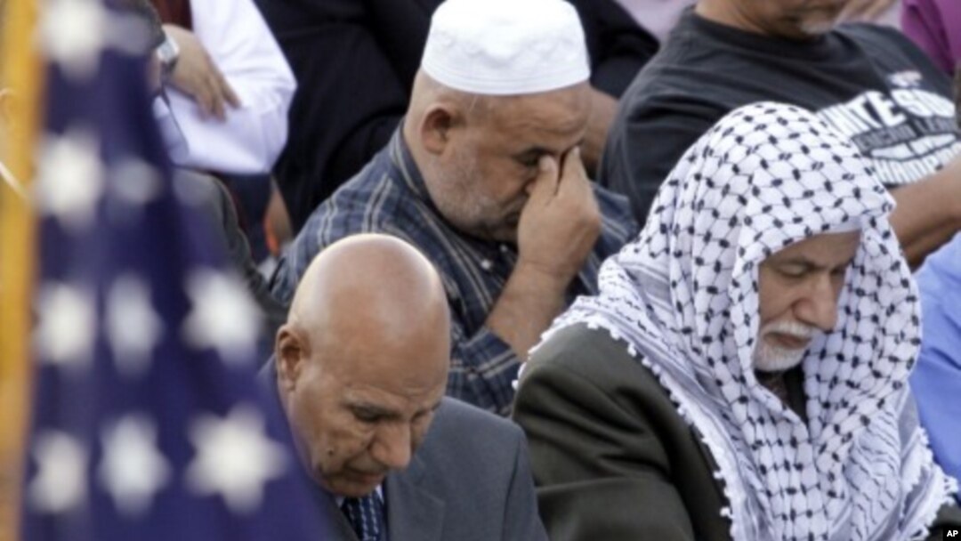 An American flag adorns the stage as worshippers gather for prayer during Eid al-Fitr morning services marking the end of the Muslim holy month of Ramadan at Toyota Park in Bridgeview, Illinois (File)