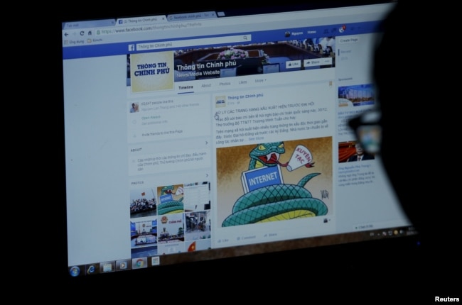 FILE - An internet user browses through the Vietnamese government's new Facebook page in Hanoi, Vietnam December 30, 2015. REUTERS/Kham/File Photo