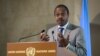 L'ancien ministre de la Santé de la RDC, Oly Ilunga, intervient, le 15 juillet 2019 à Genève. (Photo FABRICE COFFRINI / AFP)