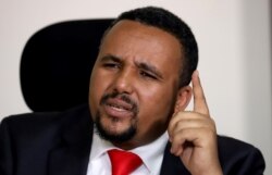FILE - Jawar Mohammed, an Oromo activist and leader of the Oromo protest speaks during a Reuters interview at his house in Addis Ababa, Ethiopia, Oct. 23, 2019.
