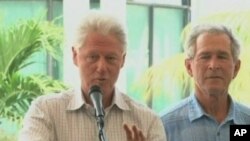 Former presidents Bill Clinton and George Bush speak at donor's conference for Haiti reconstruction aid