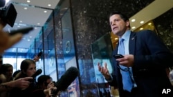 FILE - Anthony Scaramucci talks with media at Trump Tower in New York, Nov. 17, 2016.