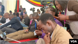 Journalists listen to President Emmerson Mnangagwa in Victoria Falls, Zimbabwe, June 25, 2019. (Columbus Mavhunga/VOA)