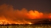 Cooler weather helps firefighters corral a third of big California blaze