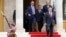Jordanian King Abdullah II, right, leaves following a meeting at the Jordanian Royal Palace in Amman, Jan. 15, 2017. 