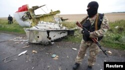 克里米亞親俄羅斯的分裂主義者在馬航MH17航班墜機現場