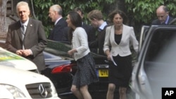 Prince Willam's fiancee Kate Middleton leaves Westminster Abbey with her mother Carole and Prince Harry, en route to Clarence House in London, April 28, 2011