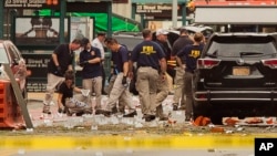 FILE - Members of the Federal Bureau of Investigation work at the scene of an explosion in the Chelsea neighborhood of New York City, Sept. 18, 2016. Ahmad Khan Rahimi was charged in the blast, which occurred the day before.