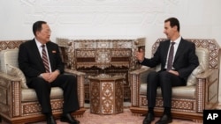 Ông Ri Yong Ho gặp Tổng thống Syria Bashar al-Assad hôm 4/12.
