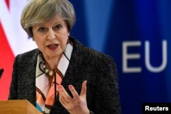 Britain's Prime Minister Theresa May attends a news conference during an EU summit in Brussels, Belgium, March 9, 2017.
