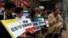 香港團體中聯辦外抗議促釋放近期被捕人士