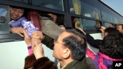 FILE - Tens of thousands of South Koreans have held reunions with their North Korean family members since the 1980s, as these people did at Diamond Mountain in North Korea, Feb. 25, 2014.