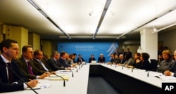 German Minister of Foreign Affairs Frank-Walter Steinmeier (center right) leads a meeting of the Ministry of Foreign Affairs' crisis management group after the attack on the German consulate in northern Afghan city of Mazar-i-Sharif, in Berlin, Nov. 11, 2016.