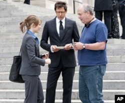 Director Roger Michell (right) confers with Rachel McAdams (playing Becky Fuller, left) and Jeff Goldblum (playing Jerry Barnes, center) on the set of Paramount Pictures’ MORNING GLORY.