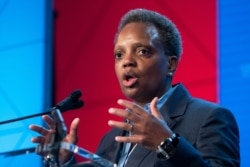 FILE - Chicago Mayor Lori Lightfoot​, speaks at the ​U.S. Conference of Mayors' Winter Meeting in Washington, Jan. 23, 2020.