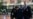 U.S. Drug Enforcement agents and Colombian police escort Luis Alfredo Carrillo Ortiz, alias "Gocho" an alleged member of the Tren de Aragua transnational gang, into a police station in Bogota, Colombia, Thursday, Feb. 6, 2025. 