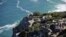 Tourists enjoy the view from Cape Point on the southern tip of the Cape Peninsula, about 50 kilometers south of Cape Town, South Africa, May 2010.