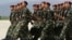 Syrian soldiers parade during a farewell ceremony in the Bekaa Valley, Lebanon, 2005. (AP)