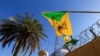 Flamuri i grupit militant Kataib Hezbollah, të mbështetur nga Irani