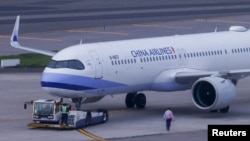 FILE - A China Airlines plane is seen at Taiwan Taoyuan International Airport in Taoyuan, Taiwan, April 12, 2023. 