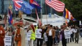 More than 100 Cambodians rallied before the UN headquarters in Geneva Tuesday, protesting human rights abuses in Cambodia and demanding free and fair elections in 2013. (Photo courtesy of SRP France) 