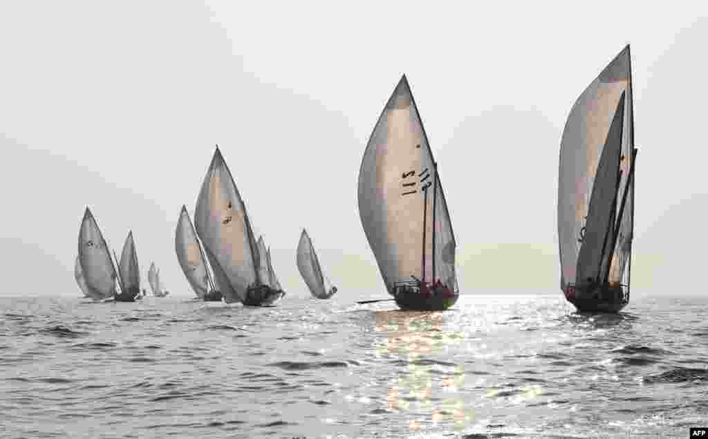 Emirati competitors take part in the Dalma Sailing Festival in the waters of Dalma Island in the Gulf, about 40 kilometers off of the Emirati capital, Abu Dhabi.