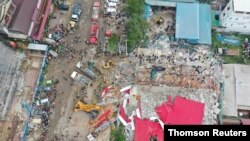 An overhead view of a collapsed under-construction building in Sihanoukville, Cambodia, June 22, 2019.