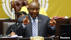 FILE: South African President Ramaphosa responds to questions in parliament, in Cape Town