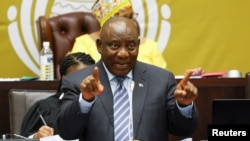 FILE: South African President Ramaphosa responds to questions in parliament, in Cape Town. Taken September 29, 2022