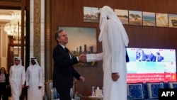 U.S. Secretary of State Antony Blinken meets with Qatar's emir Sheikh Tamim bin Hamad Al Thani in Doha, Oct. 24, 2024.