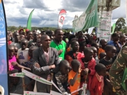 Running is big thing for Kenya, it attracts thousands of spectators. They come to see and support their future athletes who they hope will bring glory to the country. (M. Yusuf/VOA)