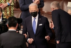 U.S. President Joe Biden arrives to deliver his first address to a joint session of the U.S. Congress at the U.S. Capitol in Washington, April 29, 2021.