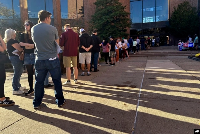 Voters line up outside the Bucks County Administration Building during early voting in the general election, Nov. 1, 2024, in Doylestown, Pennsylvania