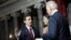 Vice President Joe Biden, right, reenacts swearing in of Sen. Brian Emanuel Schatz, D-Hawaii., left
