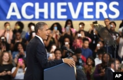 FILE - President Barack Obama speaks to students, teachers and invited guests at Benjamin Banneker Academic High School in Washington, Oct. 17, 2016.